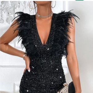 Black dress with feathers